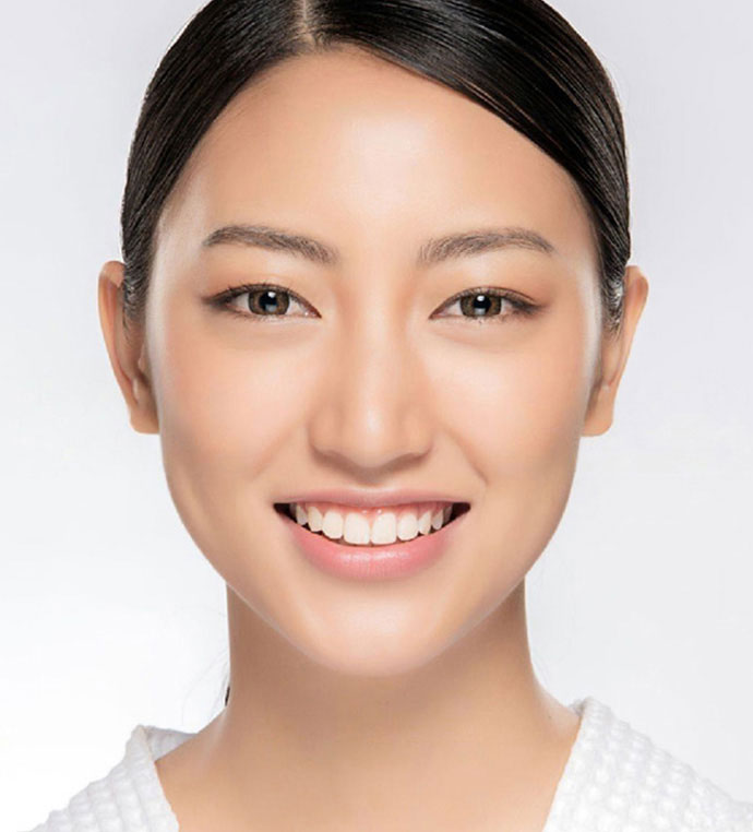 stock image of Asian women smiling