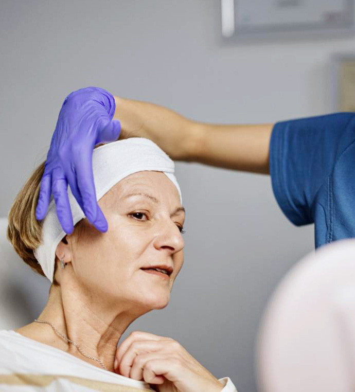stock image of old lading have mid facelift procedure
