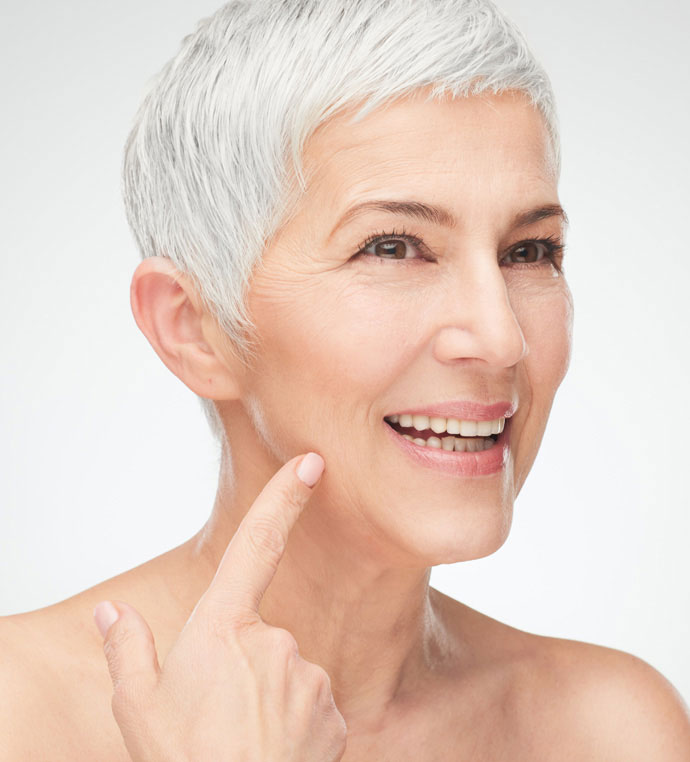 stock image of old lady showing her skin